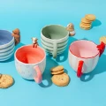 peeking-sausage-dog-mug-collection-lifestyle-blue-background_1200x1200.jpg.webp