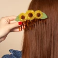 coucou-suzette-accessoire-accessory-cadeau-gift-tendance-mode-trendy-fashion-anniversaire-10-ans-peigne-comb-acetate-fleurs-flower-tournesol-sunflower-jaune-yellow-porte.jpg.webp